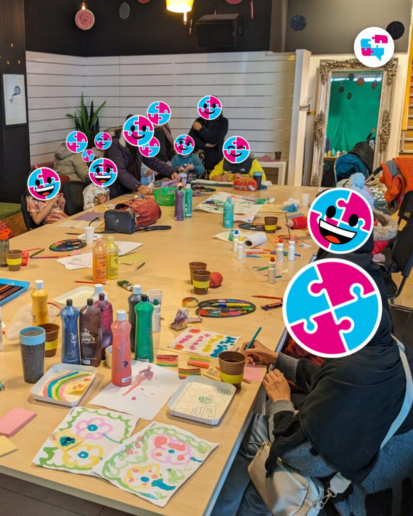 Helping Hands service users families at an event for art, reducing isolation in their peer support network