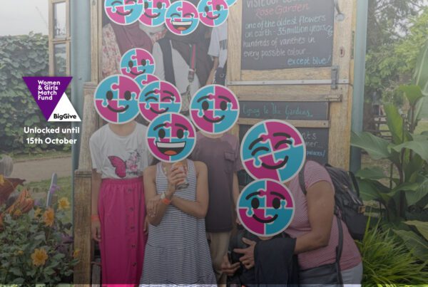 Women and families at Hampton Court with Big Give icon for the match-funded campaign which is unlocked until 15th October
